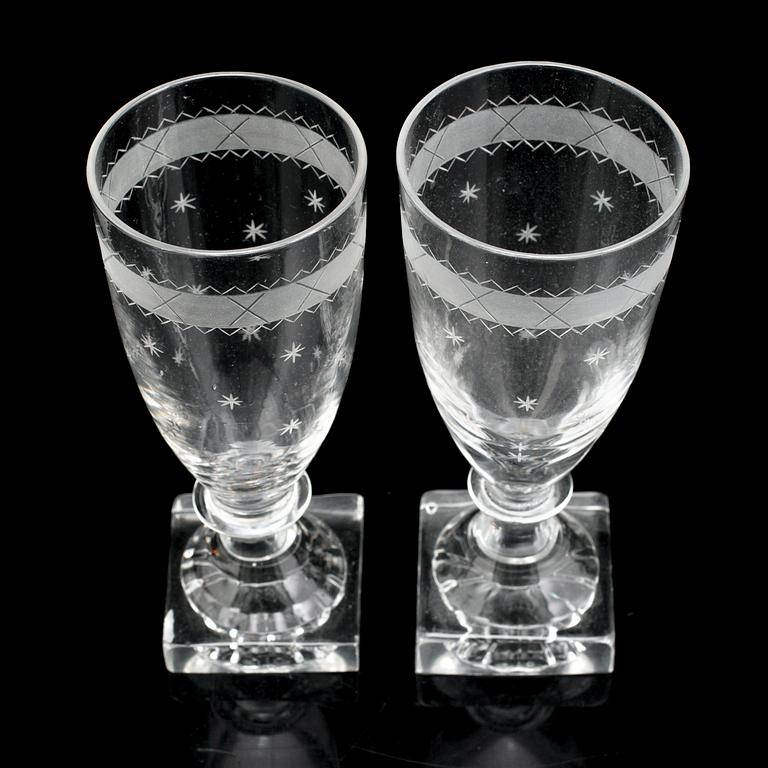 28 early 19th century champagne glasses.