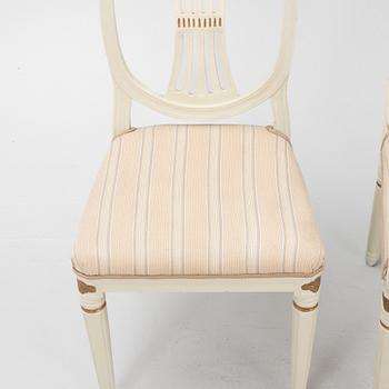 A pair of Gustavian chair and an armchair, Sweden, 19th century.
