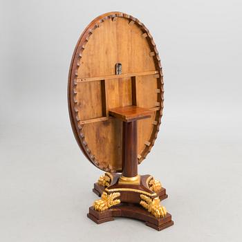 A RUSSIAN EMPIRE TILT TOP TABLE, early 19th century.