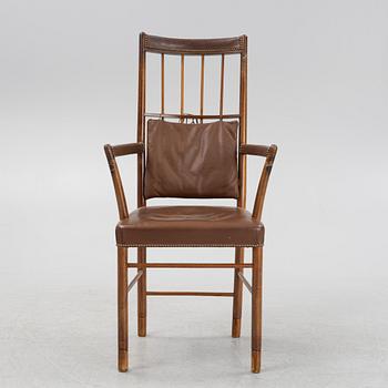 Josef Frank, a model 652 mahogany armchair, Svenskt Tenn, mid 20th Century.