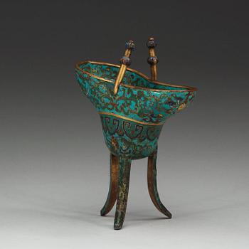 A cloisonné tripod libation cup, Qing dynasty (1644-1912).