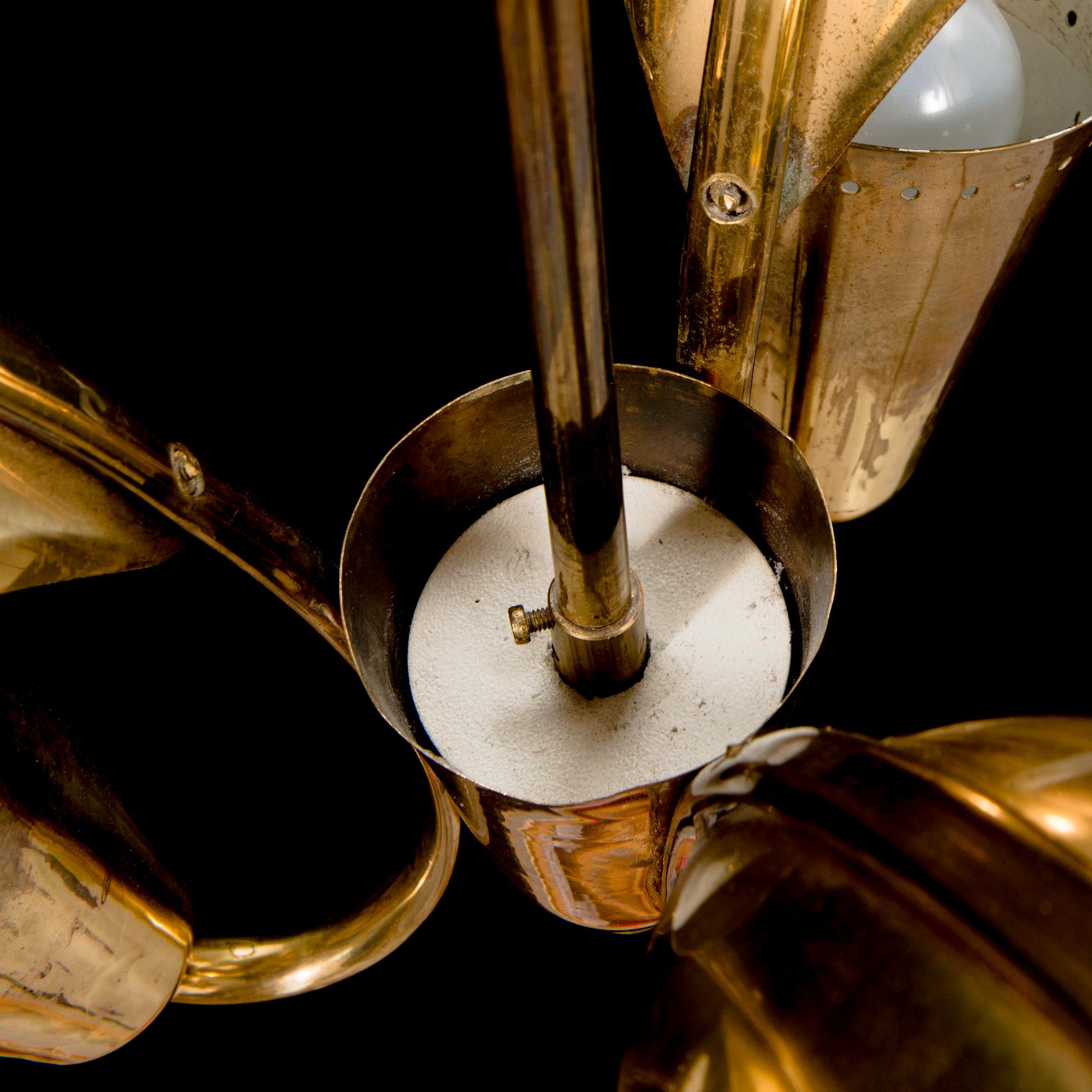 A 1950s brass pendant ceiling light model '2542/3' for Valinte, Finland.