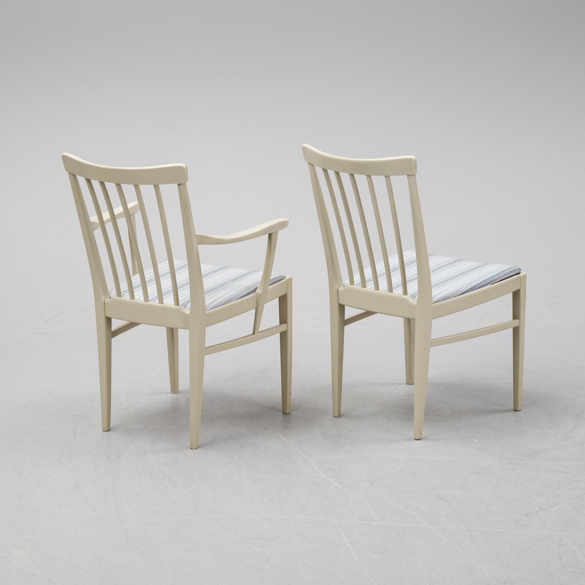 A dining table with two armchairs and six chairs by Carl Malmsten for Bodafors.