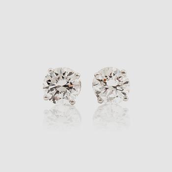 1390. A pair of brilliant-cut diamond earrings. Total carat weight 2.04 cts. Quality D/IF according to certificate from IGL.