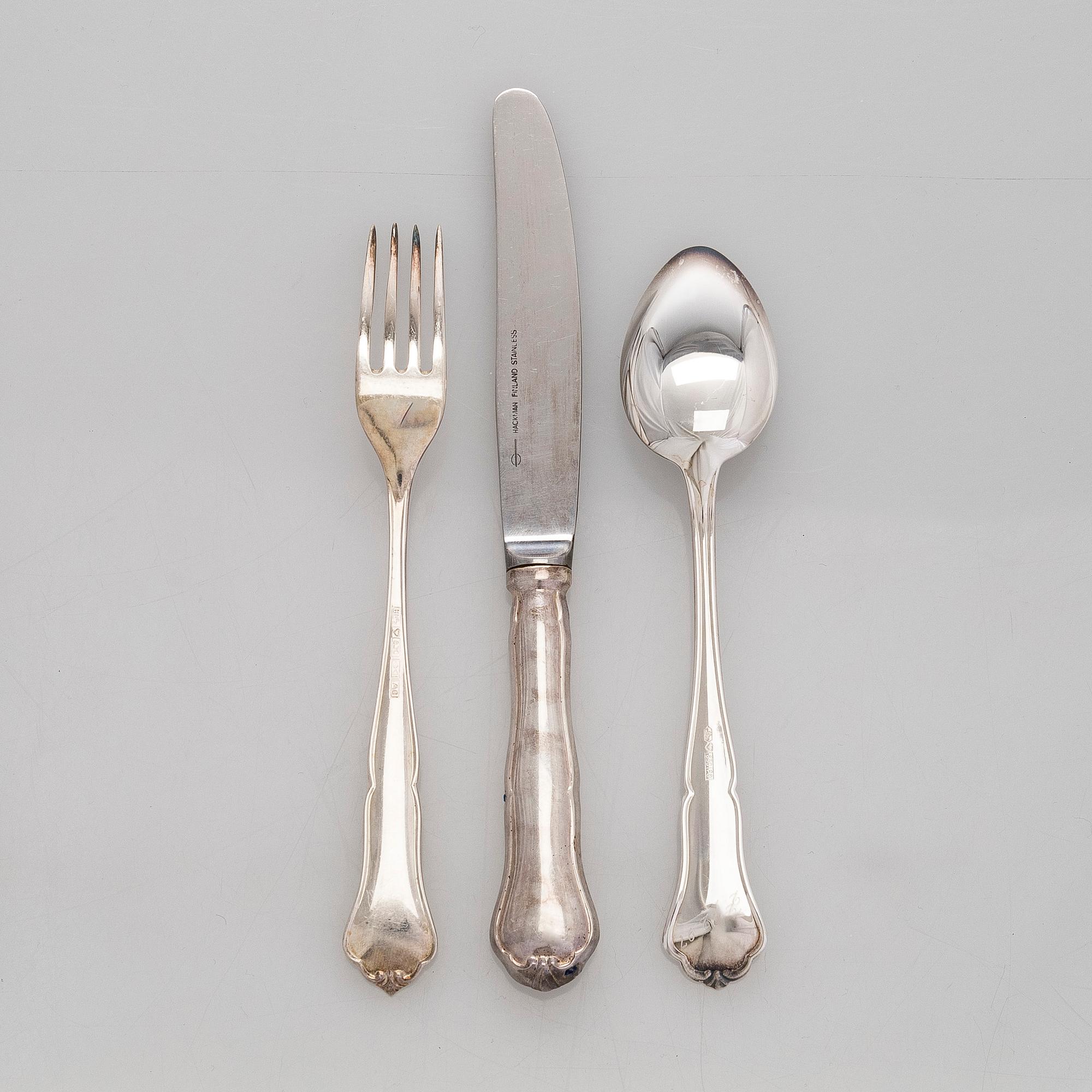 An 56-piece set of 'Chippendale' silver cutlery, Finnish hallmarks.