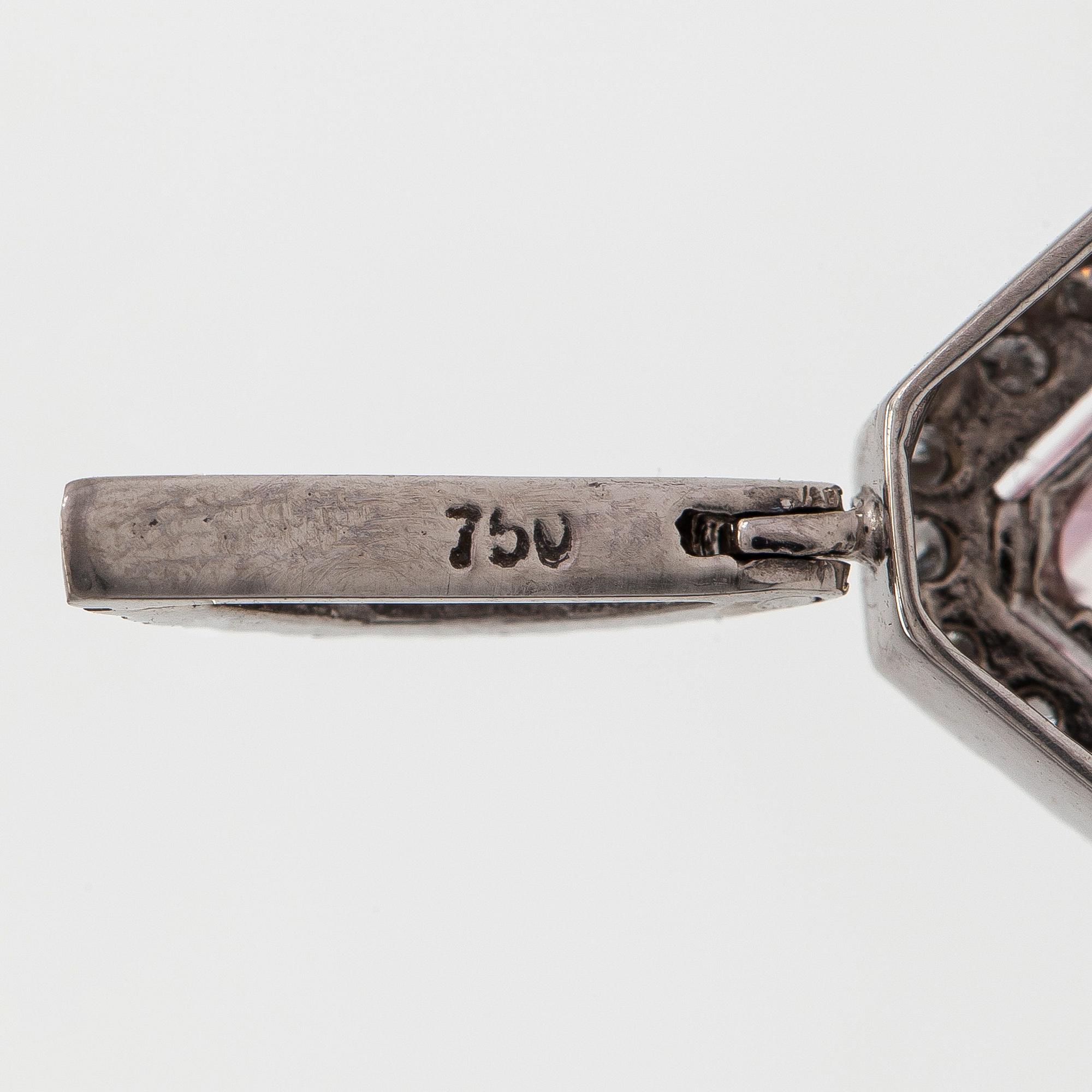 An 18K white gold pendant with a morganite and diamonds approx. 0.48 ct in total.