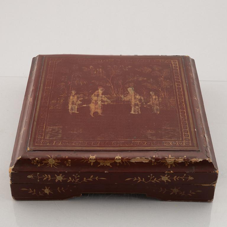 A nine piece Chinese porcelain cabaret in its original lacquer box, Qing dynasty, Qianlong (1736-95).