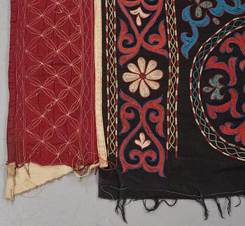 A Suzani textile, ca 247 x 128 cm.