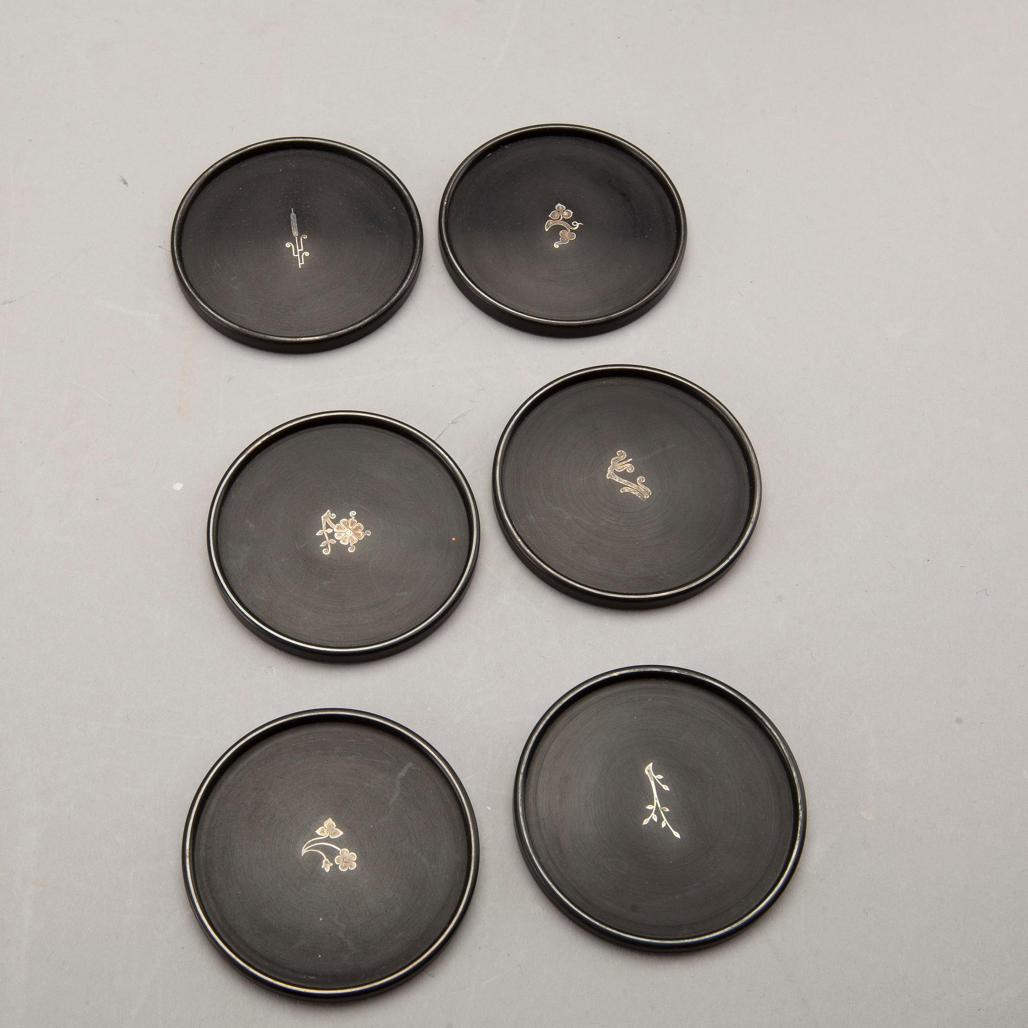 A Swedish 20th century set of 14 plates in bakelite and silver mark of T Wendt Helsingborg 1945.