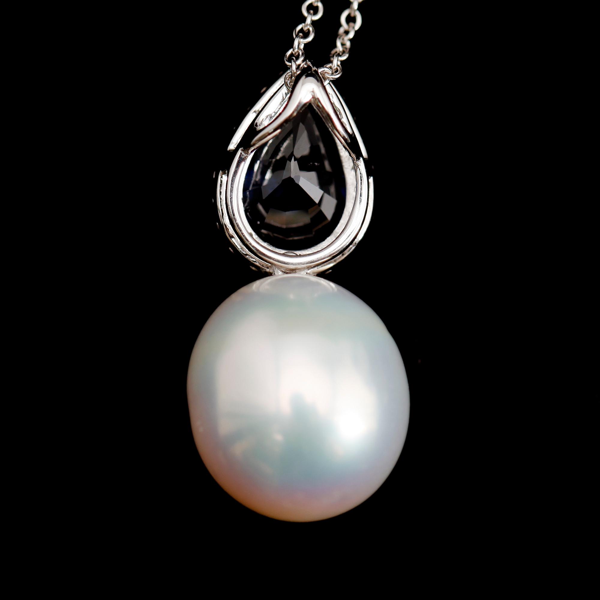 HÄNGE MED KEDJA, 18 k vitguld, stor odlad pärla, blå droppformad safir 2.04 ct, briljantslipade diamanter tot ca 0.18 ct.