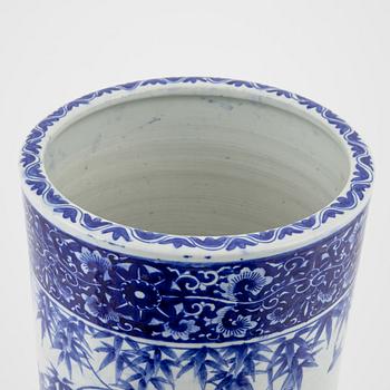 A blue and white japanese umbrella stand, 20th Century.