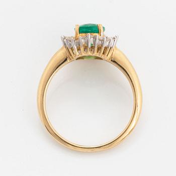Emerlad, baguette and trapets-cut diamond ring.