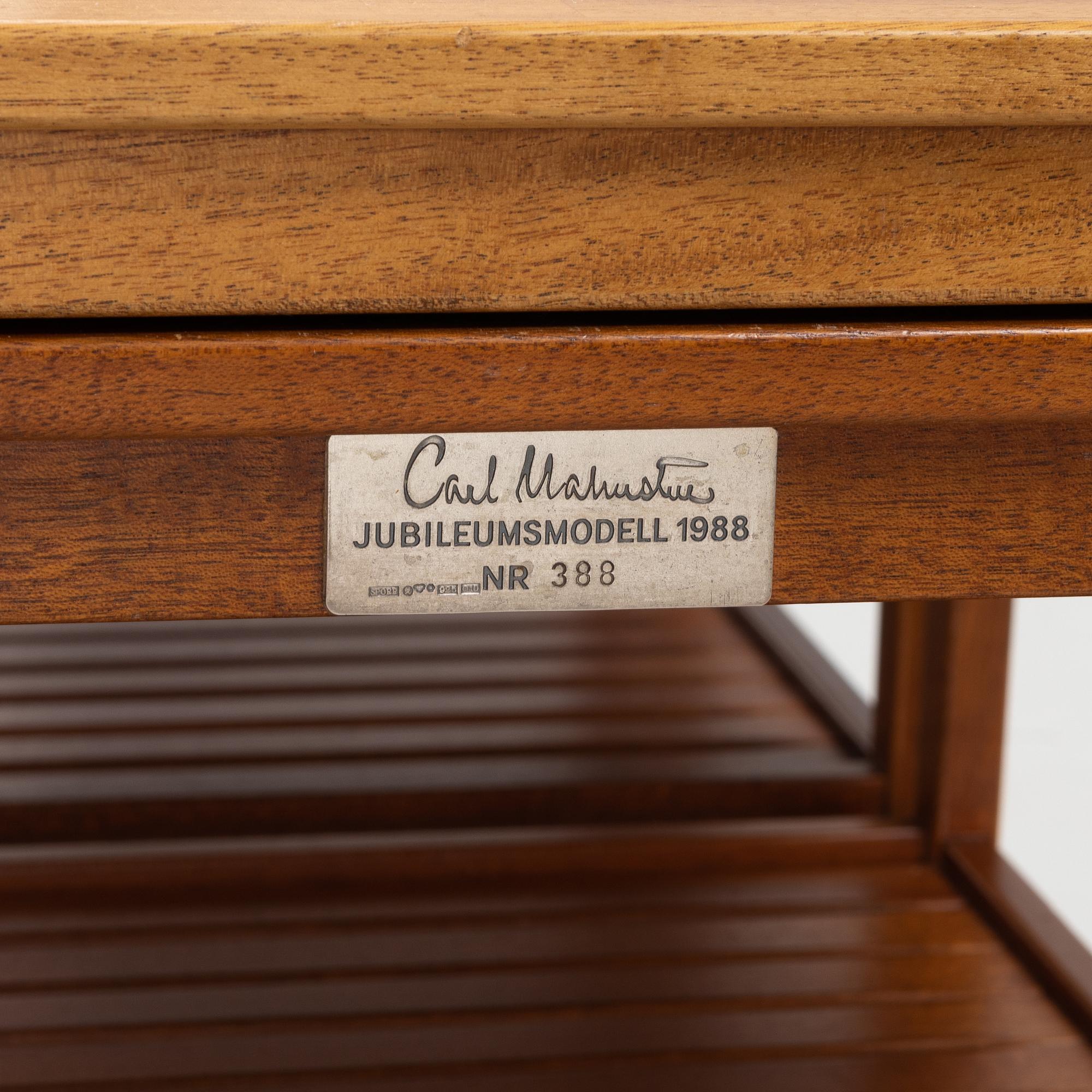 A 'Släden' nesting table by Carl Malmsten, Åfors möbelfabrik.