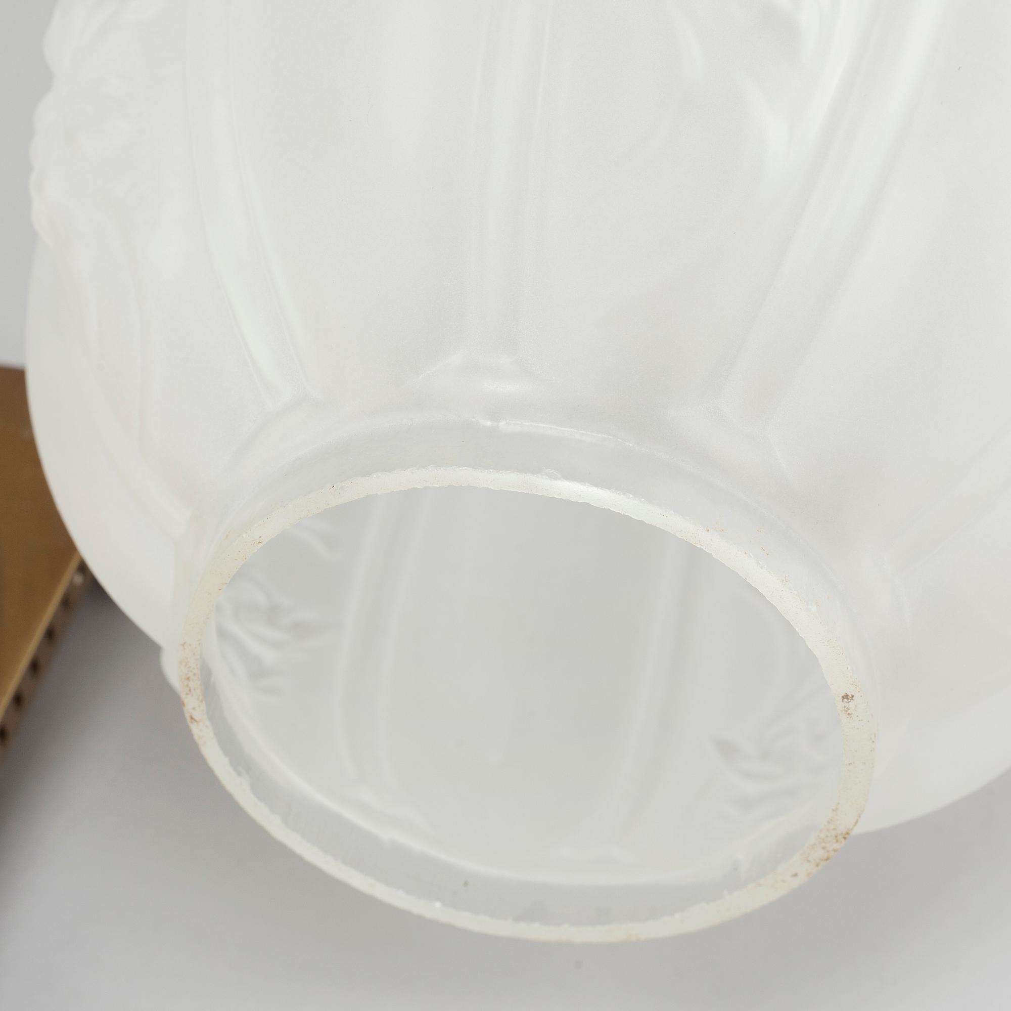 A paraffin lamp by Arvid Böhlmark in Stockholm, made around year 1900.