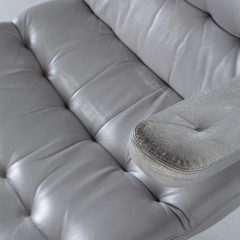 A COUPLE OF BRUNO MATHSSON ARMCHAIRS.