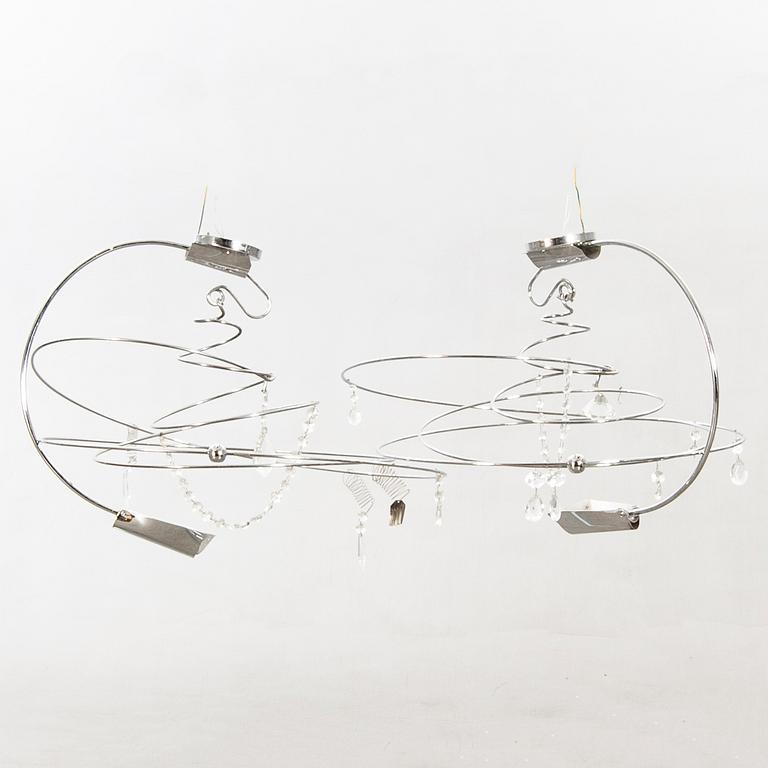 Toni Cordero, a pair of Melissa ceiling lamps for Artemide italy later part of the 20th century.