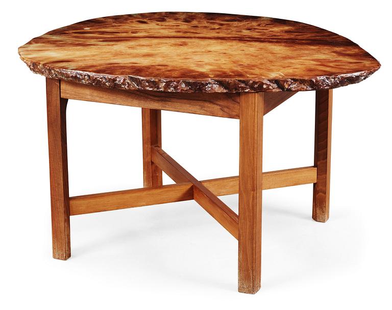 A Josef Frank agate top table on a mahogany base, by Svenskt Tenn.