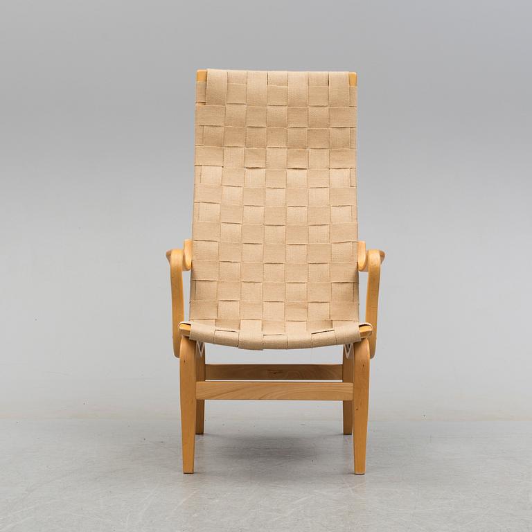 BRUNO MATHSSON, an 'Eva Hög' beech easy chair from Firma Karl Mathsson, Värnamo, 1971.