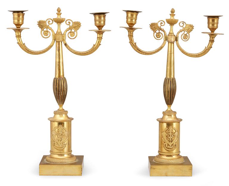 A pair of Swedish Empire 19th century gilt bronze two-light candelabra.