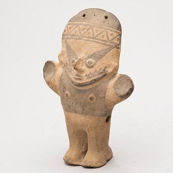 An earthenware 1200-1450 AD Central Peru figurine. Chancay culture.