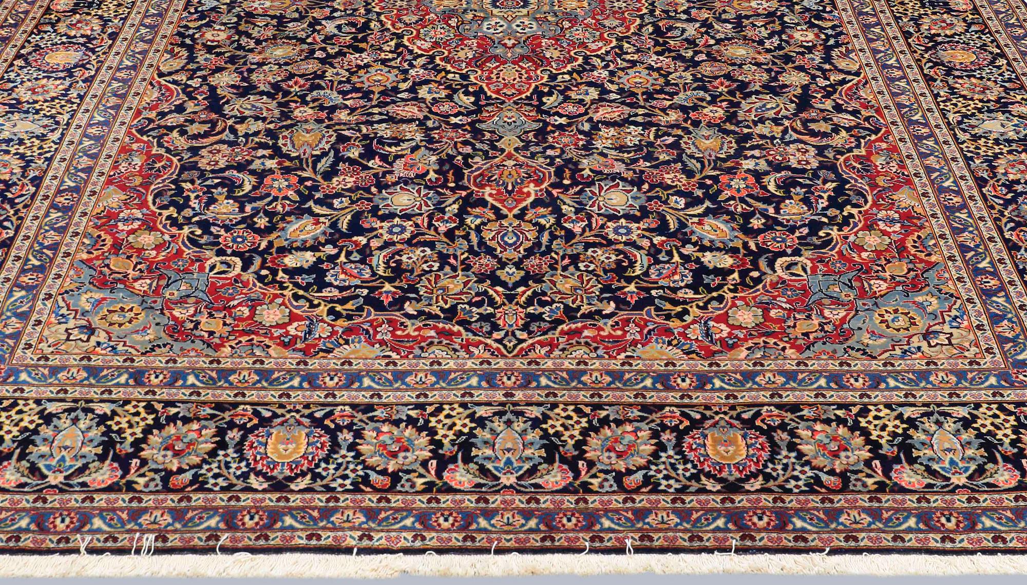 A Keshan carpet, 338 x 264 cm.
