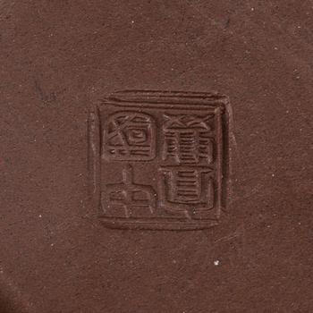 A group of three yixing pots, 20th century.