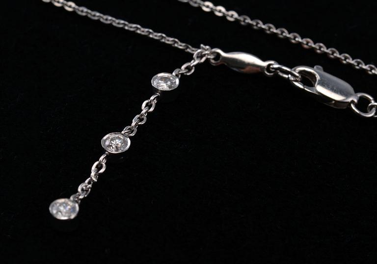 A PENDANT, heart-, princess-, oval- and drop cut diamonds c. 2.84 ct. H-G/vs. 18K white gold. Weight 5,5 g.