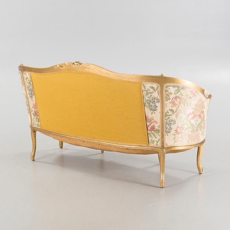 A rococo style sofa from the first half of the 20th century.