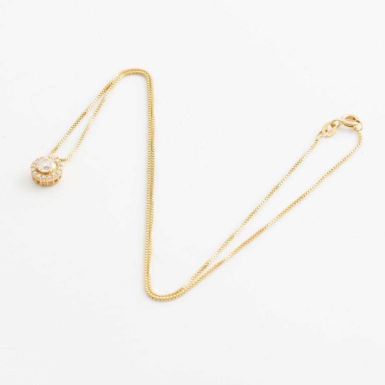 Hängsmycke 18K guld med runda briljantslipade diamanter.