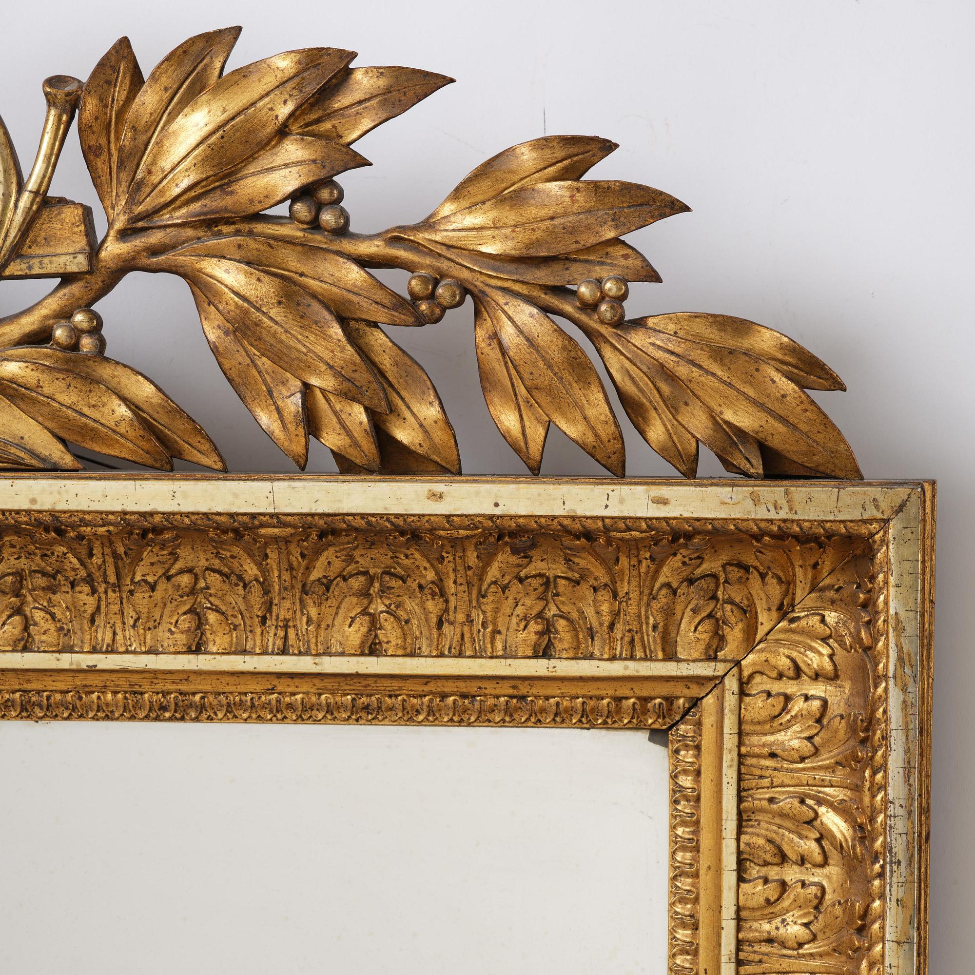 A two-branch Empire giltwood girandole mirror by P. G. Bylander (master in Gothenburg 1811-58).