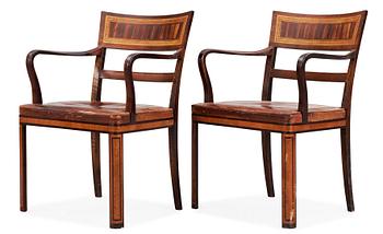A pair of cabinetmaker Edvin Johansson palisander and stained birch armchairs, Stockholm 1932.