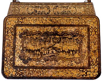 A gold and black lacquer sewing table, Qing dynasty, ca 1800.