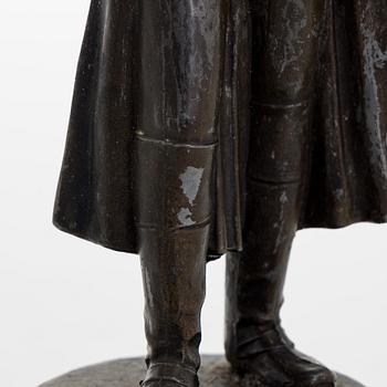 A 20th century patinated white metal sculpture.