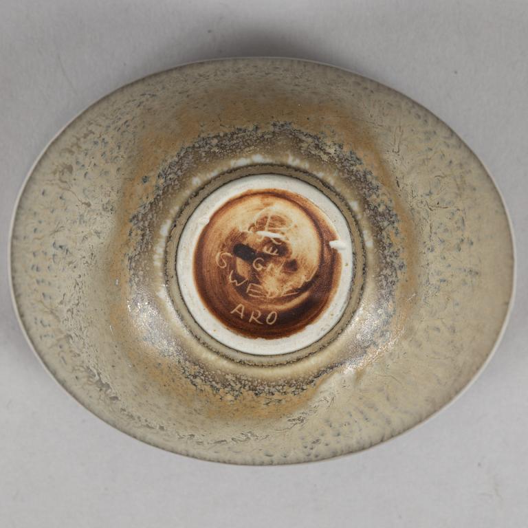 Tea pot, two bowls, two creamers, and a vase by Gunnar Nylund, stoneware, Rörstrand.