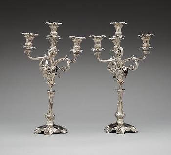 A pair of Swedish 19th century silver candelabra, makers mark of  Gustaf Möllenborg Feron 1861.