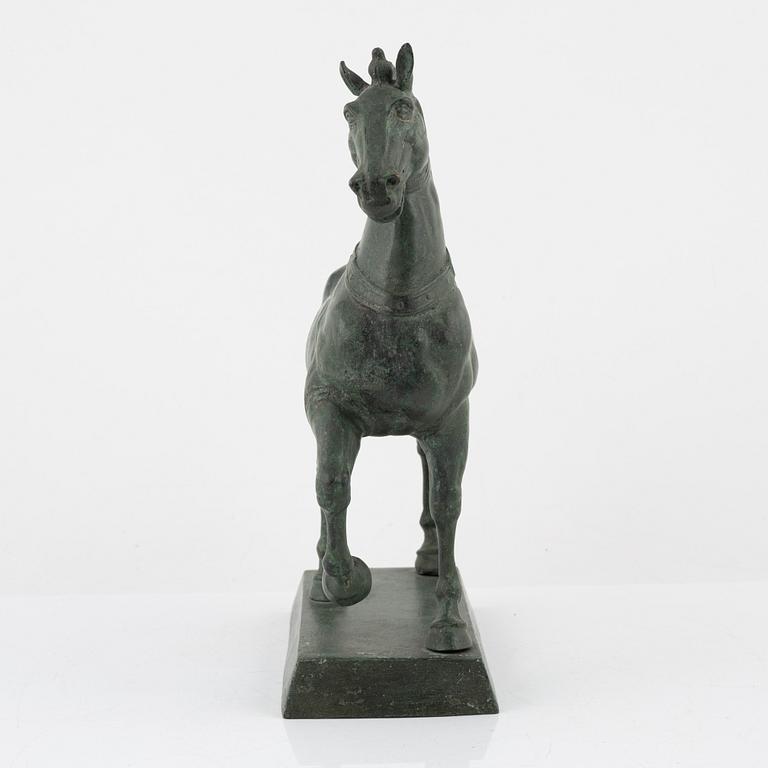 A patinated metal sculpture after the Horses of Saint Mark.