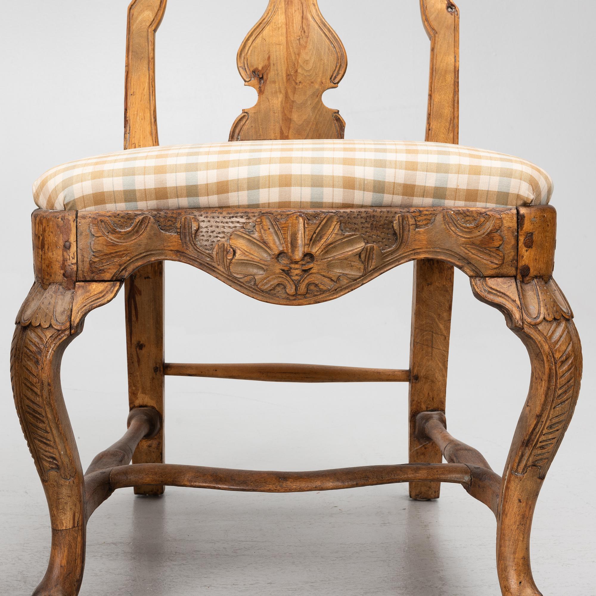 An assembled suite of ten rococo chairs, Western Sweden, later part 18th century.