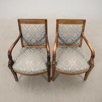 Armchairs, a pair in the Empire style, circa 1900.