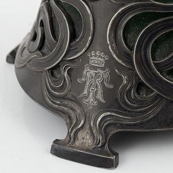 A silver plate and glass decanter, Art Nouveau, early 20th century.