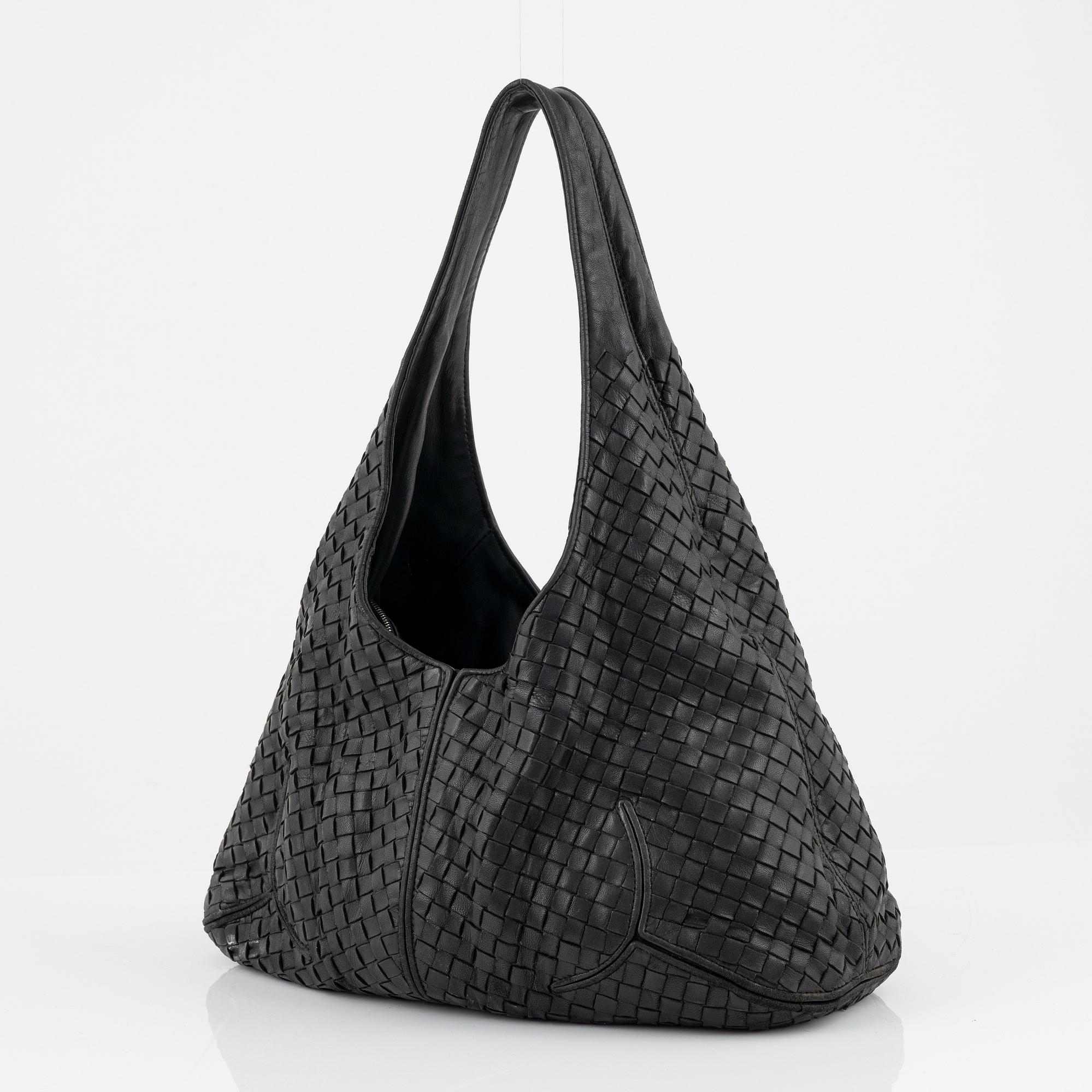 Bottega veneta, a black leather bag.