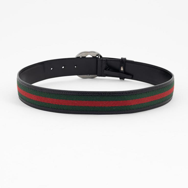 Gucci, a leather and textile belt, size 80.