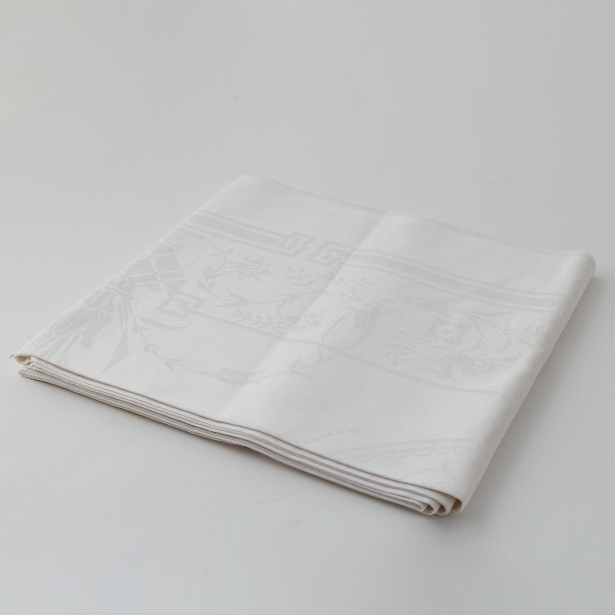 Two linen damask tablecloths.