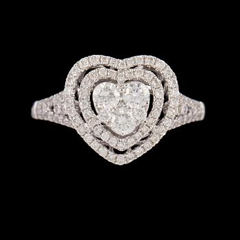RING, 18k vitguld med briljantslipade diamanter, totalt 0.61 ct. Vikt 3 g.