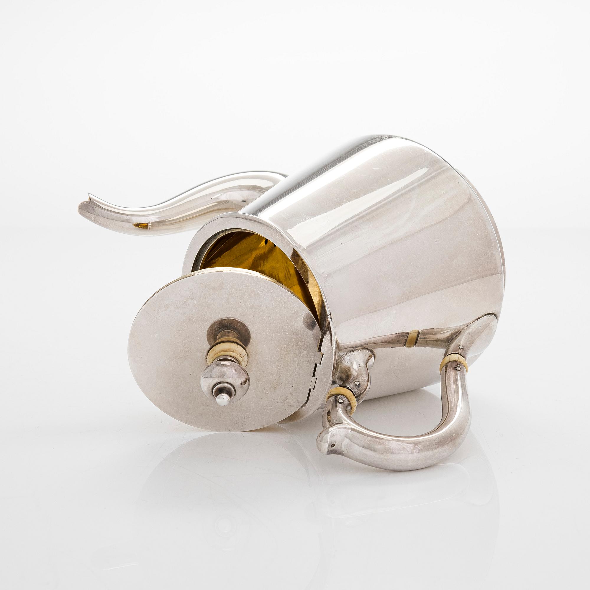 A 19th-century parcel-gilt silver teapot, maker's mark of Johan Heinoin, Saint Petersburg 1878.