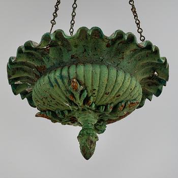 A CAST IRON  HANGING FLOWER POT, first half of the 20th century.