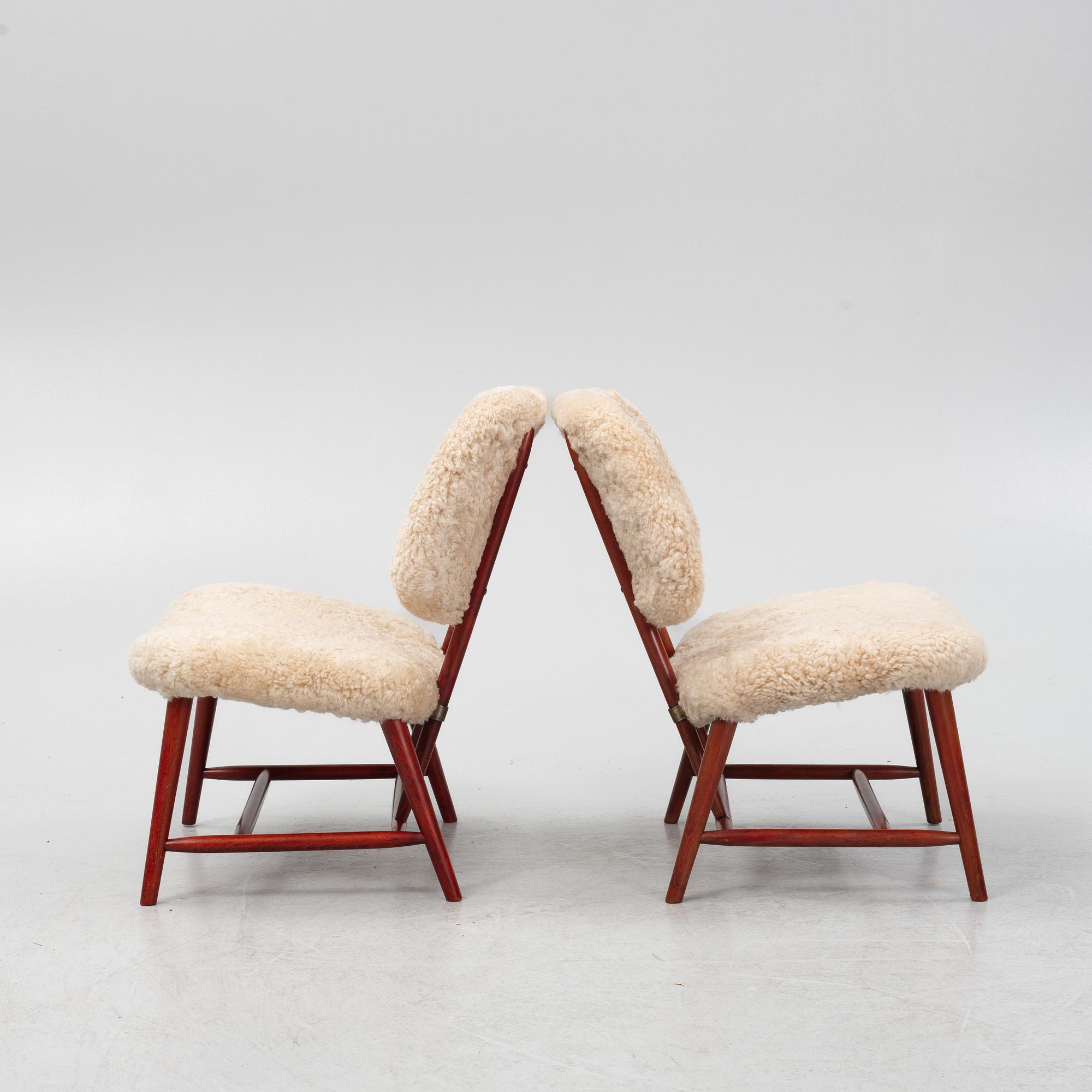 Alf Svensson, a pair of 'TeVe' easy chairs with new sheepskin upholstery, 1950s.