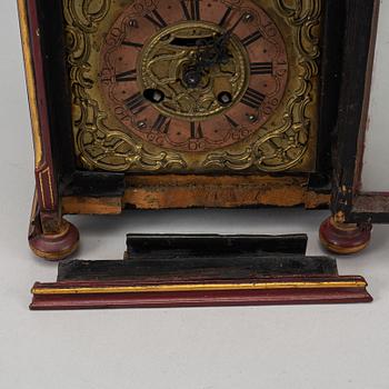 An 18th century table clock.