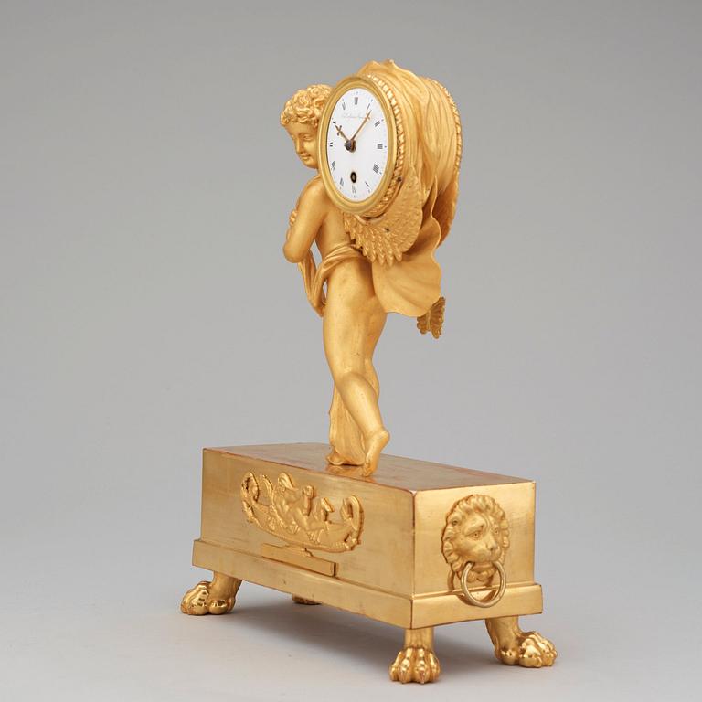 A Swedish Empire early 19th century gilt wood mantel clock by J E Callerström, master 1817.