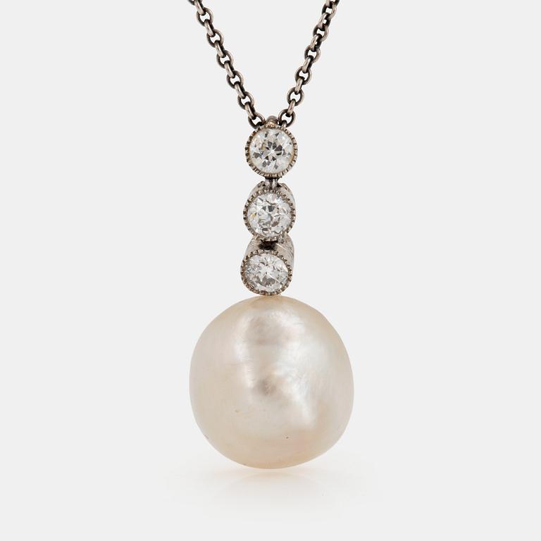 A platinum and pearl pendant set with old-cut diamonds.