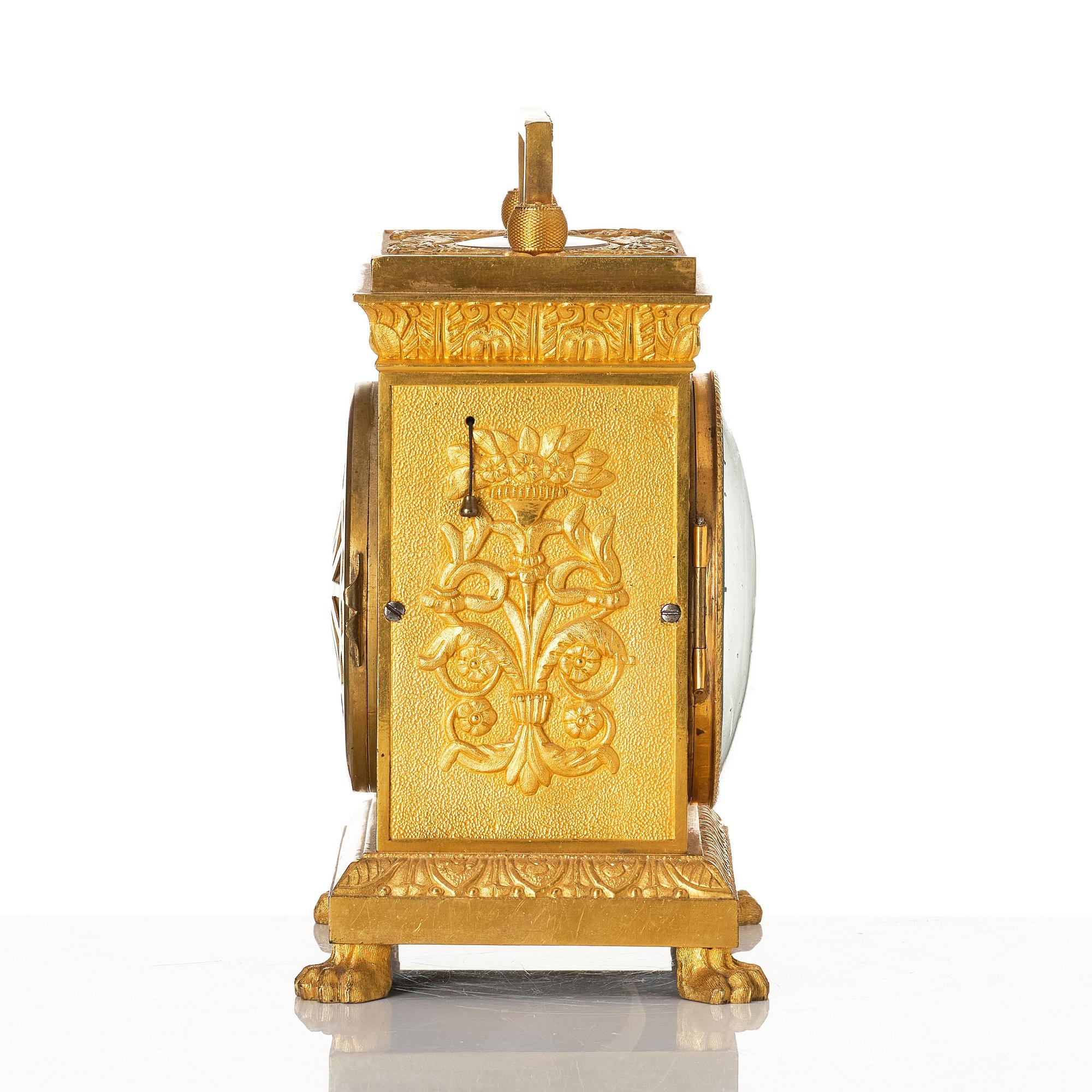 A late empire mantel clock, mid 19th century.